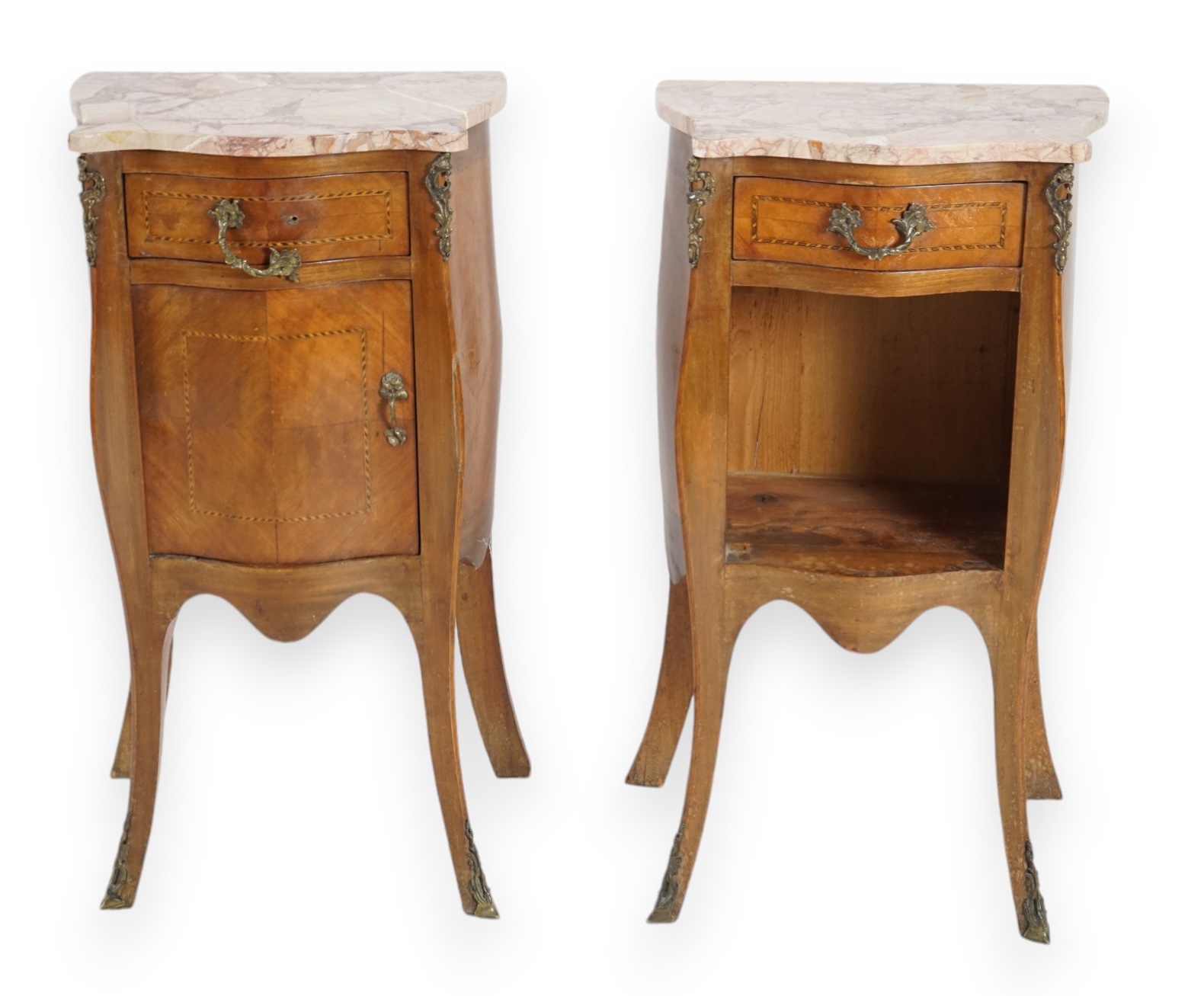 A pair of French marbled top inlaid mahogany bedside chests